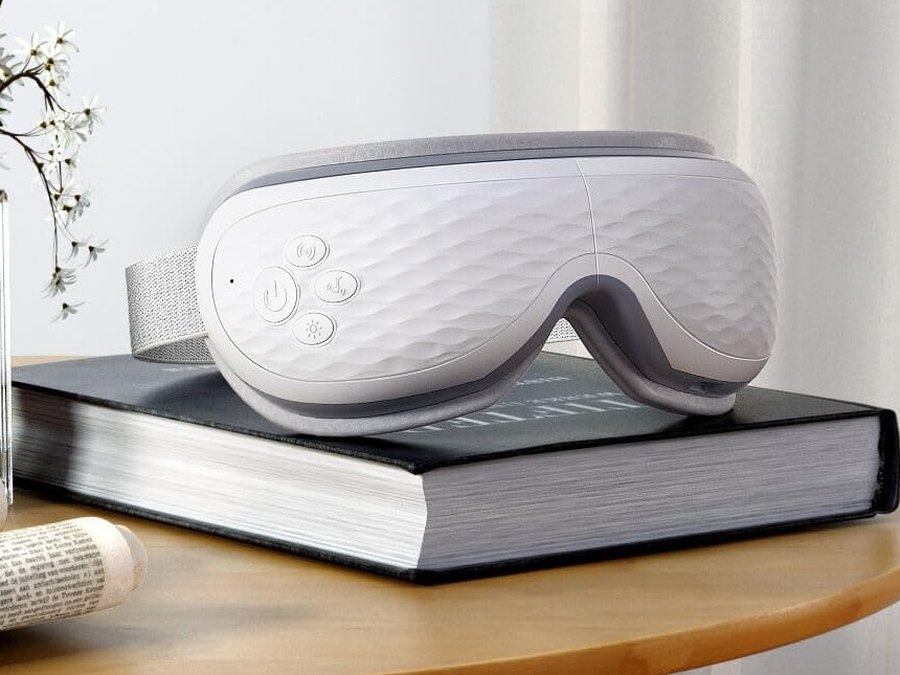 Kaisum eye massager built for ALLJOY, textured white face and grey band