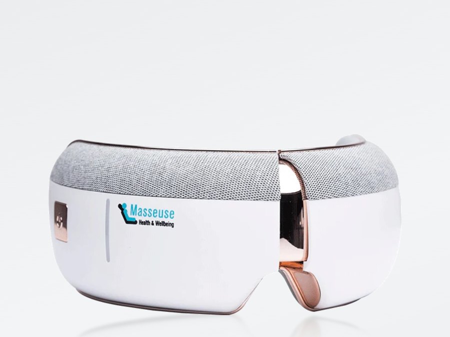 Kaisum eye massager built for Masseuse, grey mesh crown over a white shell with the Masseuse wordmark